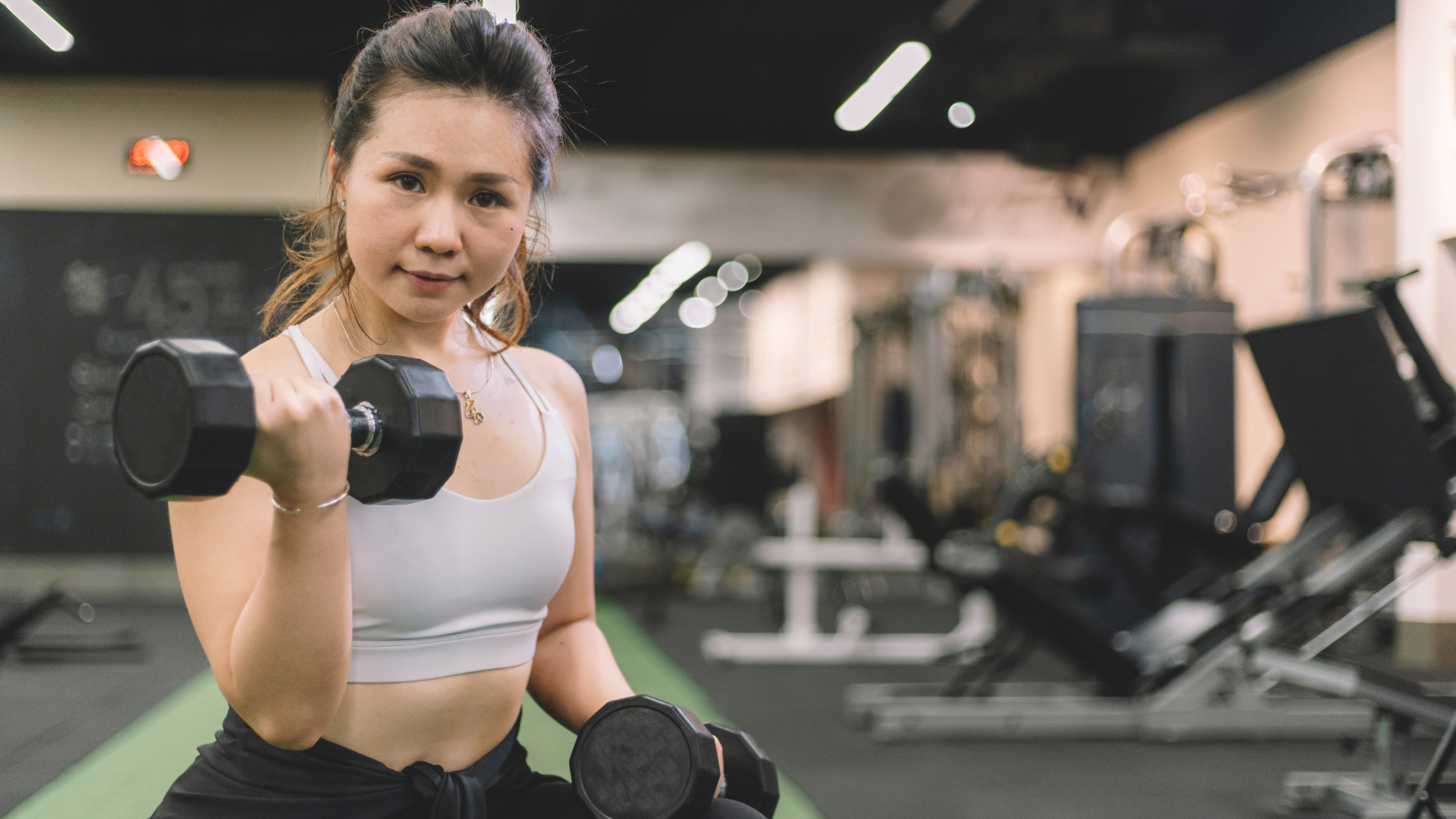 asian woman strength train | Limitless Gym Hong Kong